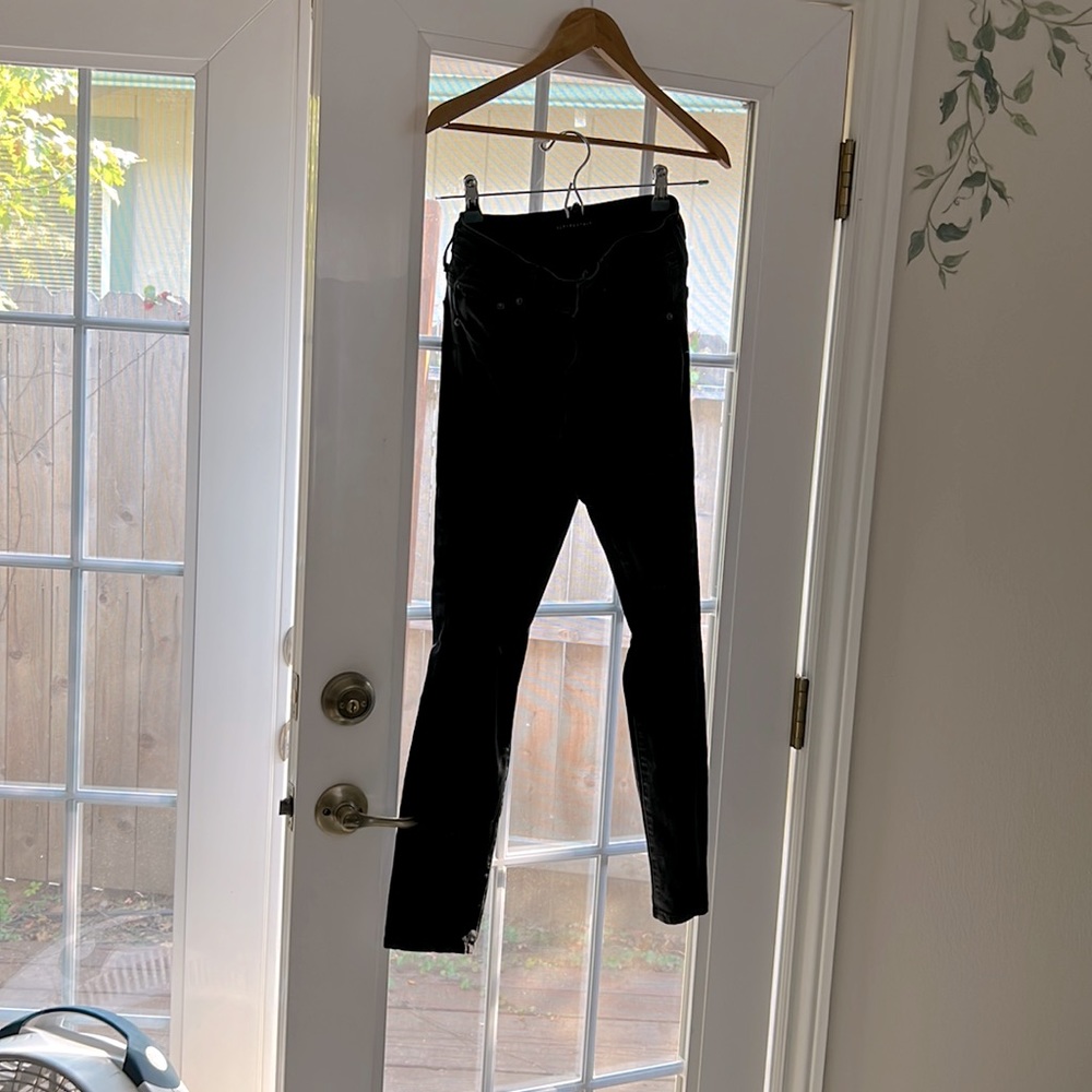 Black jeans with holes